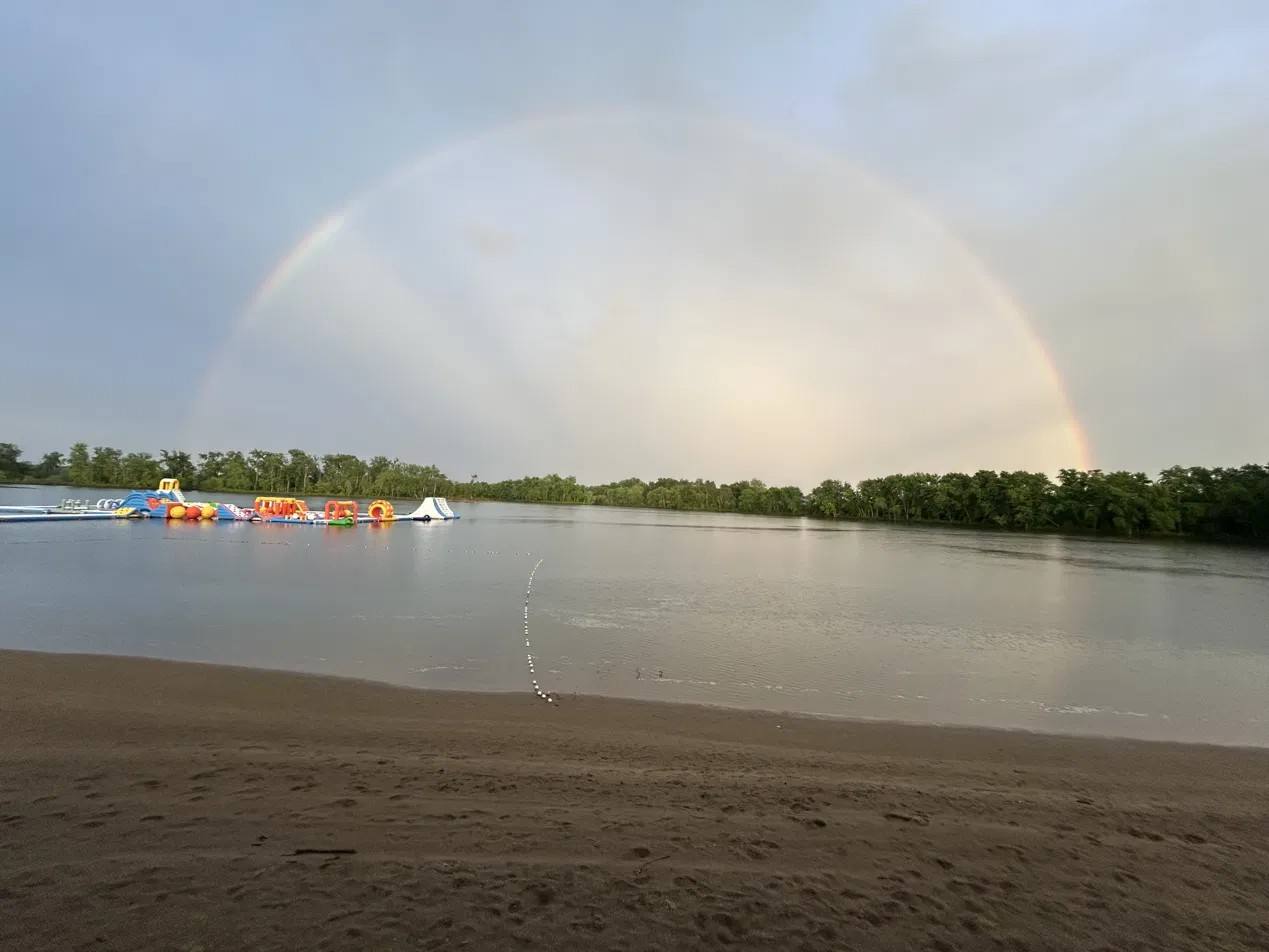 Rainbow over the 75-acre lake at Lazy L Lake Campground